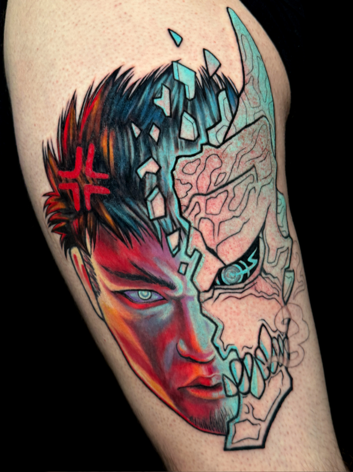Anime split-face mask tattoo design